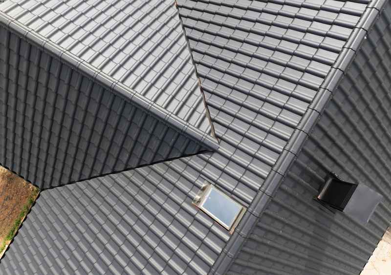 comparing natural and synthetic slate roofs