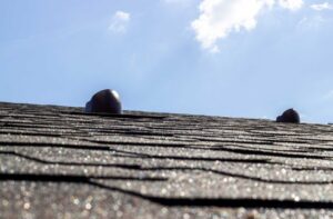 sun exposure affects roof aging in Raymore, MO