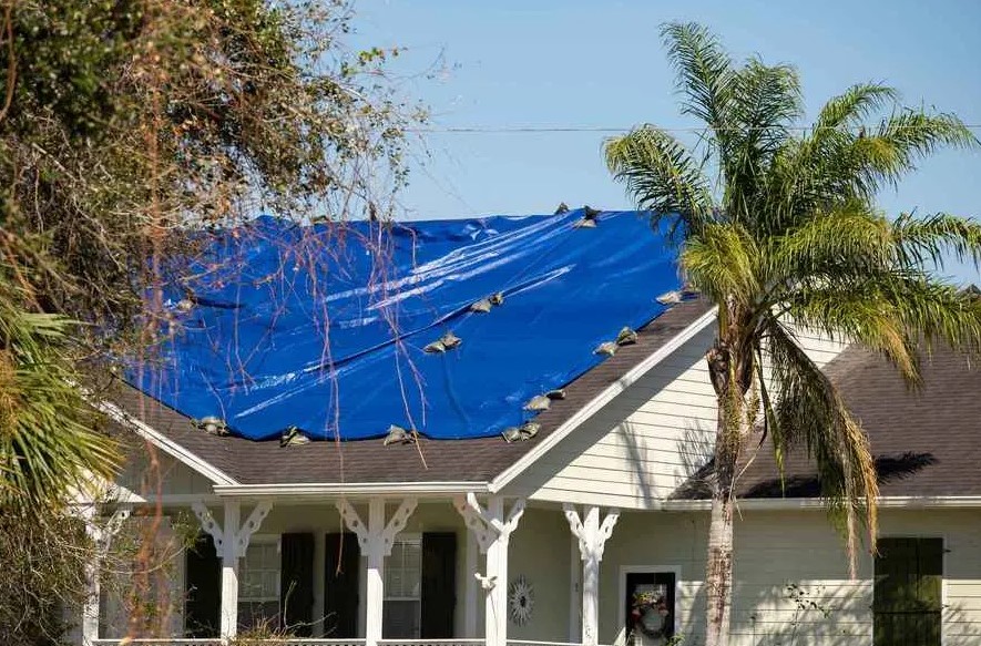 emergency roof tarping in Raymore, MO